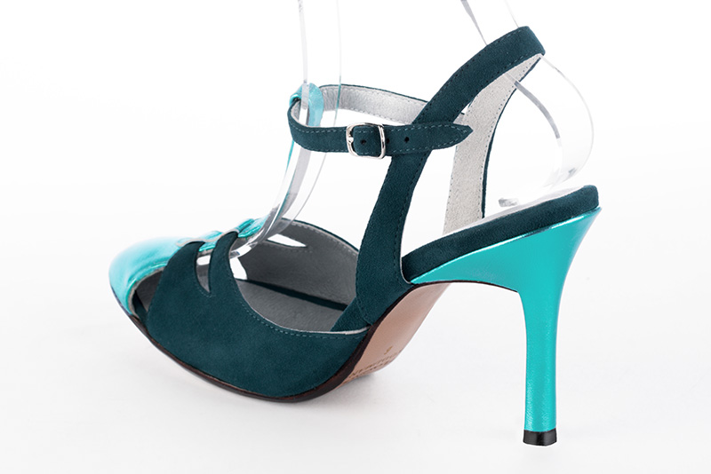 Aquamarine blue women's open back T-strap shoes. Round toe. Very high slim heel. Rear view - Florence KOOIJMAN